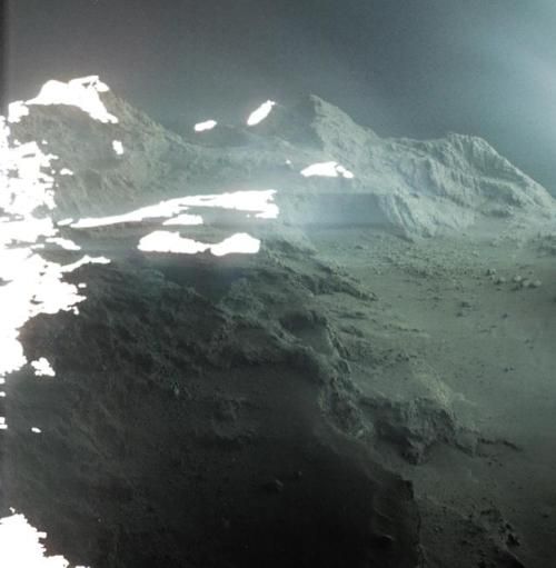 photos-of-space:

The hauntingly beautiful landscape of Comet...