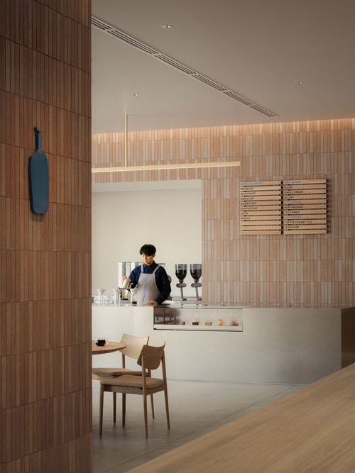 Locally produced tiles clad walls and table in Blue Bottle Coffe