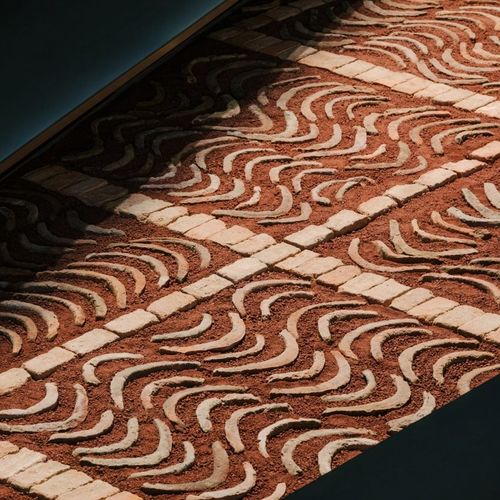 Hermès showcases "connection with the earth" with patterned ston